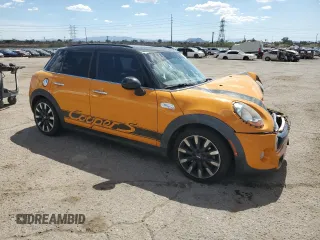 2015 MINI Hardtop 4 Door S with VIN WMWXU3C59F2B58555, listed as a Copart auction lot 64045275 with 127,596 mi miles and Salvage title. Bid and sale history available at DreamBid. Image 4.