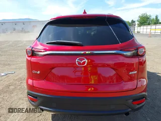 2016 Mazda CX-9 Touring z VIN JM3TCACY9G0122174, wystawiony jako IAAI lot #42613740 z przebiegiem 148 646 mil mil oraz . Historia ofert i sprzedaży dostępna na DreamBid. Obrazek 16.