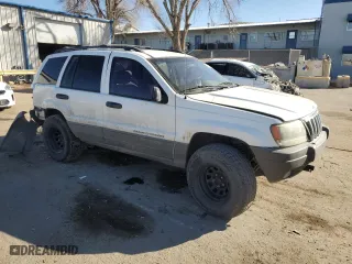 2002 Jeep Grand Cherokee Laredo with VIN 1J4GW48S72C298133, listed as a Copart auction lot 43973315 with 266,437 mi miles and Salvage Title. Bid and sale history available at carsss.com. Image 4.