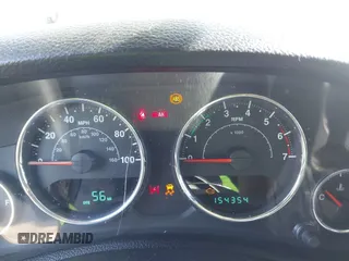 2011 Jeep Wrangler Unlimited Sport with VIN 1J4BA3H18BL598323, listed as a IAAI auction lot 41958043 with 154,354 mi miles. Bid and sale history available at carsss.com. Image 7.