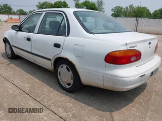 2001 Chevrolet Prizm z VIN 1Y1SK52881Z428636, wystawiony jako IAAI lot #42372783 z przebiegiem 169 729 mil mil oraz . Historia ofert i sprzedaży dostępna na DreamBid. Obrazek 3.