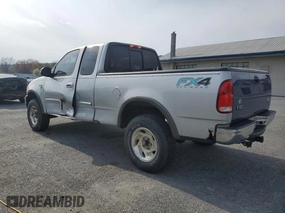 2003 Ford F-150 XL with VIN 1FTRX18L23NA66919, listed as a Copart auction lot 52911285 with 153,870 mi miles and Salvage Title. Bid and sale history available at carsss.com. Image 2.