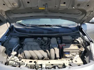 2012 Nissan Versa SV with VIN 3N1CN7AP8CL818508, listed as a Copart auction lot 63164515 with 94,455 mi miles and Salvage title. Bid and sale history available at DreamBid. Image 11.