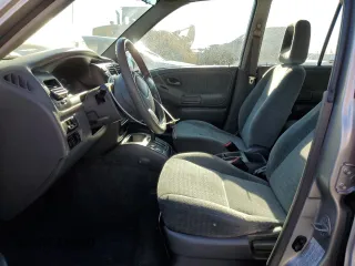 2002 Suzuki Vitara JLS z VIN 2S3TE52V126109079, wystawiony jako Copart lot #41477725 z przebiegiem 147 255 mil mil oraz Szkody całkowita. Historia ofert i sprzedaży dostępna na DreamBid. Obrazek 7.