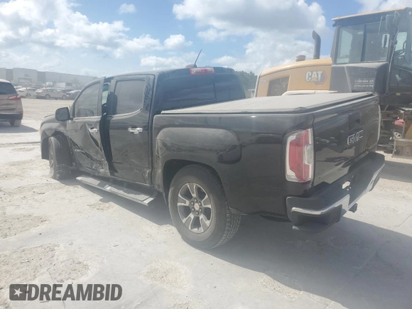 2015 GMC Canyon 2WD SLT with VIN 1GTG5CE31F1263234, listed as a Copart auction lot 76512794 with 113,180 mi miles and Salvage Title. Bid and sale history available at carsss.com. Image 2.