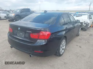 2014 BMW 3 Series 335i with VIN WBA3A9C54EF478025, listed as a IAAI auction lot 41513191 with 119,632 mi miles. Bid and sale history available at carsss.com. Image 4.