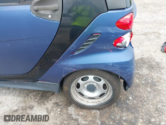 2013 Smart fortwo Pure with VIN WMEEJ3BA6DK664115, listed as a IAAI auction lot 42412198 with 64,522 mi miles and . Bid and sale history available at DreamBid. Image 6.