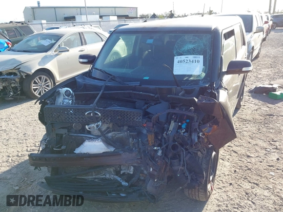 2010 Scion xB with VIN JTLZE4FE8A1113455, listed as a IAAI auction lot 40523410 with 1 mi miles. Bid and sale history available at carsss.com. Image 6.
