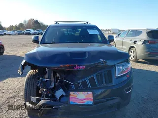 2014 Jeep Grand Cherokee Laredo with VIN 1C4RJEAG3EC218128, listed as a IAAI auction lot 40951611 with 119,596 mi miles and . Bid and sale history available at DreamBid. Image 12.