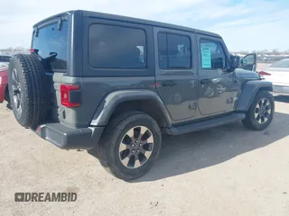 2018 Jeep Wrangler Unlimited Sahara z VIN 1C4HJXEN9JW215890, wystawiony jako IAAI lot #41215063 z przebiegiem 39 567 mil mil oraz . Historia ofert i sprzedaży dostępna na DreamBid. Obrazek 4.