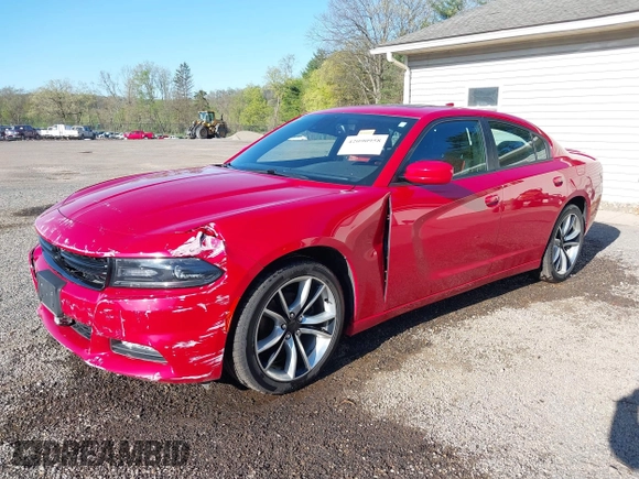 2015 Dodge Charger SXT with VIN 2C3CDXHGXFH858399, listed as a IAAI auction lot 42090958 with 71,488 mi miles and . Bid and sale history available at DreamBid. Image 2.