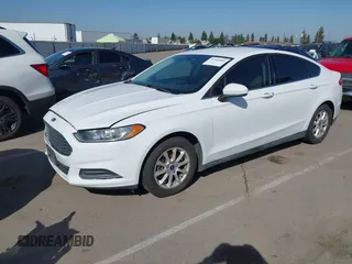 2016 Ford Fusion S z VIN 3FA6P0G79GR157809, wystawiony jako IAAI lot #41994860 z przebiegiem 161 049 mil mil oraz . Historia ofert i sprzedaży dostępna na DreamBid. Obrazek 2.