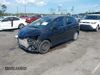 2016 Honda Fit LX with VIN JHMGK5H57GS010902, listed as a IAAI auction lot 41902395 with 124,531 mi miles. Bid and sale history available at carsss.com. Image 18.