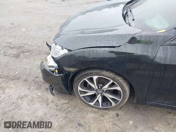 2019 Honda Civic Sport with VIN 2HGFC2F86KH566920, listed as a IAAI auction lot 41838032 with 58,917 mi miles and . Bid and sale history available at DreamBid. Image 6.