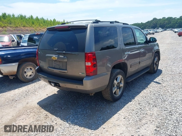 2012 Chevrolet Tahoe LT with VIN 1GNSCBE09CR229417, listed as a IAAI auction lot 42507793 with 164,877 mi miles and . Bid and sale history available at DreamBid. Image 4.