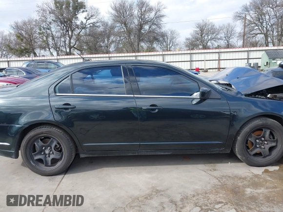 2010 Ford Fusion SE with VIN 3FAHP0HG5AR384834, listed as a IAAI auction lot 41533295 with 124,356 mi miles. Bid and sale history available at carsss.com. Image 14.
