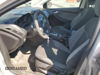 2012 Ford Focus SE z VIN 1FAHP3K20CL219046, wystawiony jako Copart lot #58771285 z przebiegiem 167 703 mil mil oraz Szkoda całkowita • Salvage title. Historia ofert i sprzedaży dostępna na DreamBid. Obrazek 7.