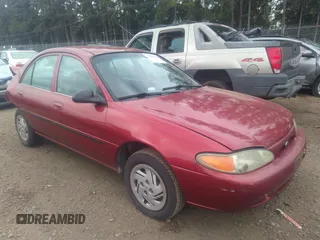 1998 Ford Escort LX z VIN 1FAFP10P4WW140458, wystawiony jako IAAI lot #37094590 z przebiegiem 216 895 mil mil oraz . Historia ofert i sprzedaży dostępna na DreamBid. Obrazek 1.