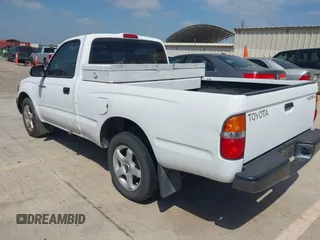 2002 Toyota Tacoma z VIN 5TENL42N62Z033844, wystawiony jako IAAI lot #42403317 z przebiegiem 130 961 mil mil oraz . Historia ofert i sprzedaży dostępna na DreamBid. Obrazek 3.