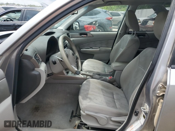2009 Subaru Forester X with VIN JF2SH63619H751208, listed as a Copart auction lot 55813154 with 174,328 mi miles and Salvage title. Bid and sale history available at DreamBid. Image 7.