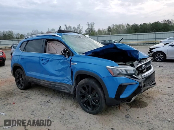 2022 Volkswagen Taos SE z VIN 3VVLX7B27NM062985, wystawiony jako Copart lot #51644395 z przebiegiem 41 883 mil mil oraz Szkody całkowita. Historia ofert i sprzedaży dostępna na DreamBid. Obrazek 11.