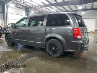 2016 Dodge Grand Caravan SXT with VIN 2C4RDGCG6GR273330, listed as a Copart auction lot 55937635 with 106,688 mi miles and Clean Title. Bid and sale history available at DreamBid. Image 2.