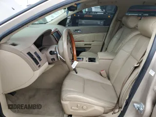 2006 Cadillac STS with VIN 1G6DC67A660194412, listed as a Copart auction lot 69878774 with 140,675 mi miles and Salvage Title. Bid and sale history available at DreamBid. Image 7.