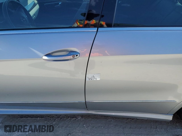 2011 Mercedes-Benz E 550 Luxury with VIN WDDHF7CB8BA312674, listed as a Copart auction lot 77816464 with Not Provided miles and Salvage Title. Bid and sale history available at DreamBid. Image 12.