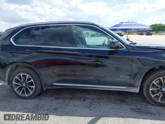 2016 BMW X5 xDrive50i with VIN 5UXKR6C51G0J81658, listed as a IAAI auction lot 41801382 with 34,572 mi miles. Bid and sale history available at carsss.com. Image 14.