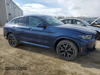 2025 BMW X4 xDrive30i with VIN 5UX33DT05S9Y19798, listed as a Copart auction lot 51861845 with 718 mi miles and Salvage Title. Bid and sale history available at carsss.com. Image 4.
