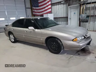 1998 Pontiac Bonneville SE z VIN 1G2HX52K6WH213866, wystawiony jako Copart lot #58358105 z przebiegiem 180 993 mil mil oraz Szkoda całkowita • Salvage title. Historia ofert i sprzedaży dostępna na DreamBid. Obrazek 4.