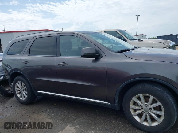 2014 Dodge Durango SXT with VIN 1C4RDHAG3EC543256, listed as a IAAI auction lot 42442851 with 73,609 mi miles and . Bid and sale history available at DreamBid. Image 14.