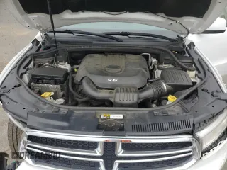 2014 Dodge Durango SXT with VIN 1C4RDJAG4EC323423, listed as a Copart auction lot 60159145 with 160,022 mi miles and Salvage title. Bid and sale history available at DreamBid. Image 12.
