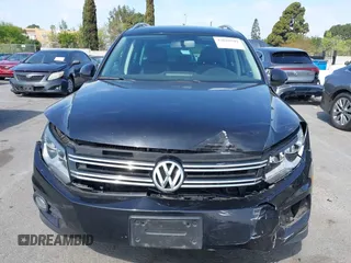 2015 Volkswagen Tiguan SE with VIN WVGAV7AX5FW509612, listed as a IAAI auction lot 42020599 with 64,201 mi miles and . Bid and sale history available at DreamBid. Image 12.