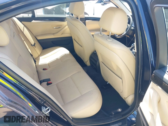 2016 BMW 5 Series 535i xDrive with VIN WBA5B3C59GG256290, listed as a IAAI auction lot 42381402 with 82,299 mi miles and . Bid and sale history available at DreamBid. Image 8.