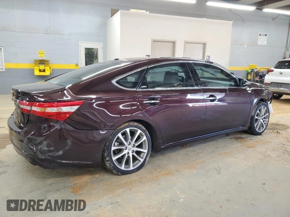 2014 Toyota Avalon Limited with VIN 4T1BK1EB7EU105830, listed as a Copart auction lot 88096505 with 106,626 mi miles and Salvage Title. Bid and sale history available at carsss.com. Image 3.
