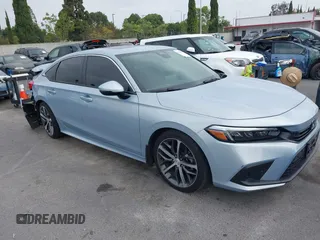 2022 Honda Civic Sedan Touring with VIN 2HGFE1F93NH328556, listed as a IAAI auction lot 39760314 with 24,564 mi miles. Bid and sale history available at carsss.com. Image 1.