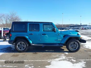 2019 Jeep Wrangler Unlimited Sahara with VIN 1C4HJXEN7KW641854, listed as a IAAI auction lot 41635091 with 51,039 mi miles and . Bid and sale history available at DreamBid. Image 13.