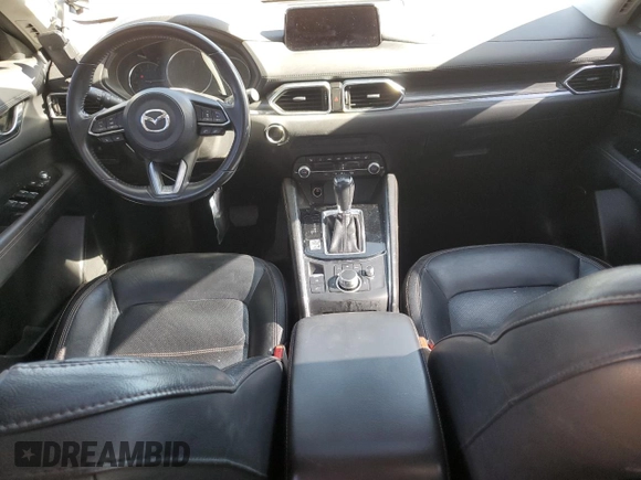 2019 Mazda CX-5 Grand Touring with VIN JM3KFADM6K0543888, listed as a Copart auction lot 56310785 with 112,737 mi miles and Salvage title. Bid and sale history available at DreamBid. Image 8.