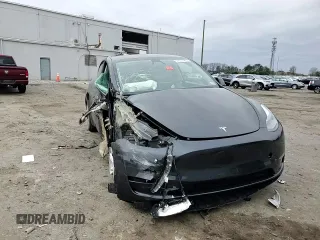2024 Tesla Model Y с VIN 7SAYGDED1RF092027, выставлен на аукционе Copart как лот 51655485 с пробегом 22 010 миль миль и Списание • Salvage title. История ставок и продаж доступна на DreamBid. Изображение 11.