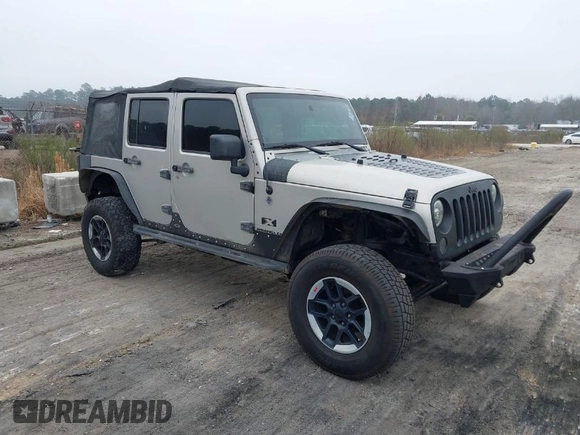 2007 Jeep Wrangler Unlimited X with VIN 1J4GA391X7L107424, listed as a IAAI auction lot 41752013 with 196,557 mi miles and . Bid and sale history available at DreamBid. Image 1.