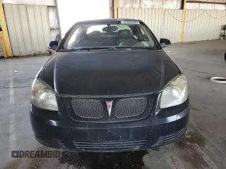 2009 Pontiac G5 z VIN 1G2AS18H797189799, wystawiony jako Copart lot #57909205 z przebiegiem 164 862 mil mil oraz Szkoda całkowita • Salvage title. Historia ofert i sprzedaży dostępna na DreamBid. Obrazek 5.