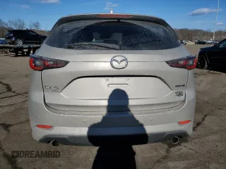 2025 Mazda CX-5 2.5 S Premium Plus Package with VIN JM3KFBEM7S0562230, listed as a Copart auction lot 47517835 with 0 mi miles and Salvage Title. Bid and sale history available at carsss.com. Image 6.