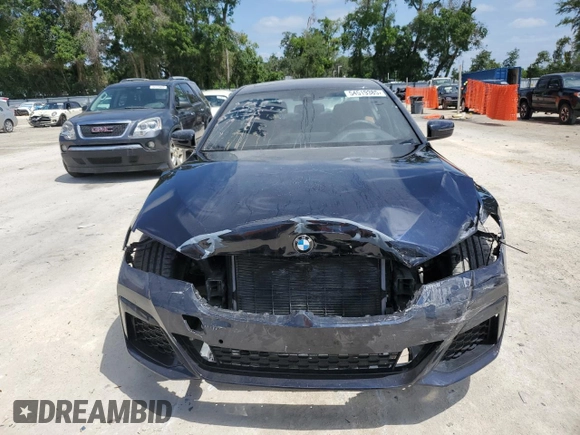 2023 BMW 5 Series 530i with VIN WBA53BH04PWY02486, listed as a Copart auction lot 54519385 with 26,979 mi miles and Salvage title. Bid and sale history available at DreamBid. Image 5.