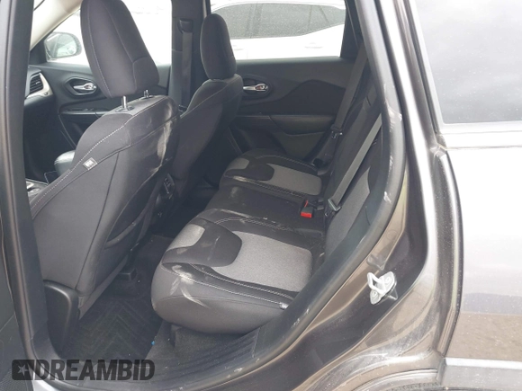 2014 Jeep Cherokee Latitude z VIN 1C4PJLCS1EW319194, wystawiony jako IAAI lot #41710491 z przebiegiem 108 136 mil mil oraz . Historia ofert i sprzedaży dostępna na DreamBid. Obrazek 8.