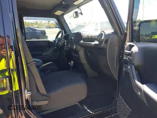 2017 Jeep Wrangler Unlimited Sport with VIN 1C4BJWDG7HL544974, listed as a IAAI auction lot 42603521 with 96,878 mi miles and . Bid and sale history available at DreamBid. Image 5.