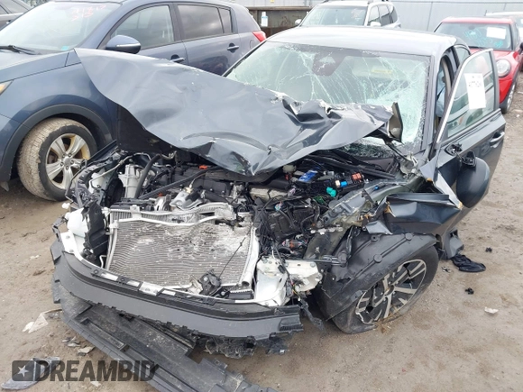 2024 Honda Civic LX z VIN 19XFL2H5XRE023870, wystawiony jako IAAI lot #41776260 z przebiegiem Nie podano mil oraz . Historia ofert i sprzedaży dostępna na DreamBid. Obrazek 6.