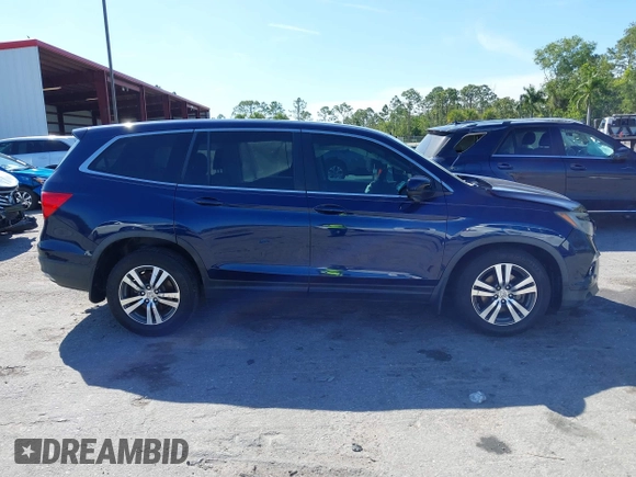 2016 Honda Pilot EX with VIN 5FNYF5H3XGB021575, listed as a IAAI auction lot 41853099 with 141,848 mi miles. Bid and sale history available at carsss.com. Image 14.