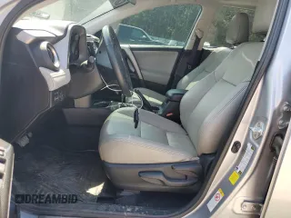 2018 Toyota RAV4 XLE with VIN 2T3WFREVXJW427748, listed as a Copart auction lot 61833055 with 104,057 mi miles and Salvage title. Bid and sale history available at DreamBid. Image 7.