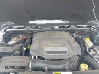 2016 Jeep Wrangler Unlimited Sahara with VIN 1C4BJWEG5GL117872, listed as a IAAI auction lot 42692798 with 119,819 mi miles and . Bid and sale history available at DreamBid. Image 10.